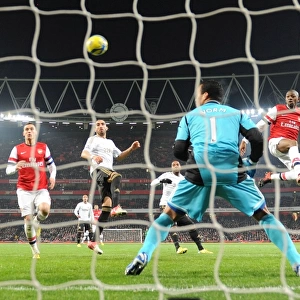 Arsenal's Abou Diaby Tries to Score Past Swansea's Michel Vorm in FA Cup Third Round Replay