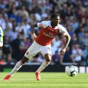 Arsenal's Ainsley Maitland-Niles Clashes with Crystal Palace's Max Meyer in Premier League Showdown