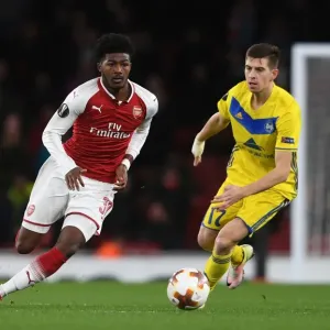 Arsenal's Ainsley Maitland-Niles Faces Off Against BATE Borisov's Aleksei Rios