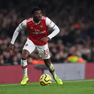Arsenal's Ainsley Maitland-Niles Goes Head-to-Head with Manchester United in Premier League Showdown (2019-20)