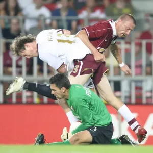Arsenal's Alex Hleb Faces Off Against Sparta Prague's Tomas Repka and Tomas Postulka in Champions League Clash Arsenal's Alex Hleb Faces Off Against Sparta Prague's Tomas Repka and Tomas Postulka in Champions League Clash