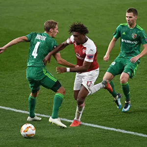 Arsenal's Alex Iwobi Clashes with Vorskla's Kobakhidze and Perduta in Europa League Match