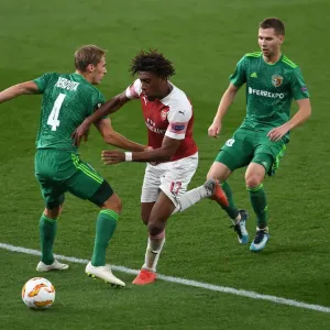 Arsenal's Alex Iwobi Clashes with Vorskla's Kobakhidze and Perduta in Europa League Match