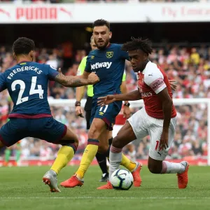 Arsenal's Alex Iwobi Clashes with West Ham's Snodgrass and Fredericks