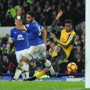 Arsenal's Alex Iwobi Faces Off Against Everton's Ashley Williams in Intense Premier League Showdown