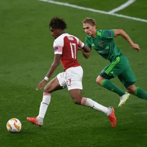 Arsenal's Alex Iwobi Faces Off Against Igor Perduta in Europa League Clash