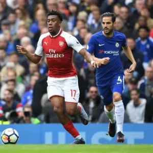 Arsenal's Alex Iwobi Outmaneuvers Chelsea's Cesc Fabregas in Premier League Clash Arsenal's Alex Iwobi Outmaneuvers Chelsea's Cesc Fabregas in Premier League Clash