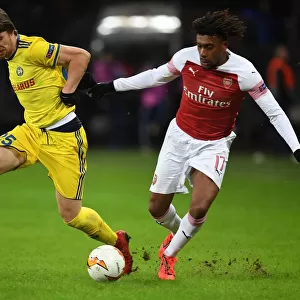 Arsenal's Alex Iwobi vs. Dmitri Baga: A Europa League Battle at BATE Borisov