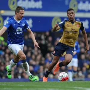 Arsenal's Alex Iwobi vs. Everton's Phil Jagielka: Intense Face-Off in Premier League Clash