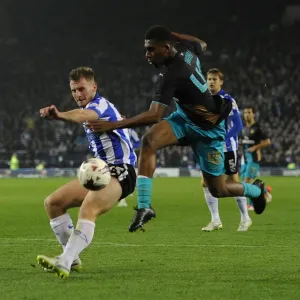 Arsenal's Alex Iwobi vs. Sheffield Wednesday's Tom Lees: A Capital One Cup Showdown