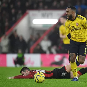 Arsenal's Alex Lacazette Outmaneuvers Bournemouth's Lewis Cook in Premier League Clash (AFC Bournemouth v Arsenal 2019-20)