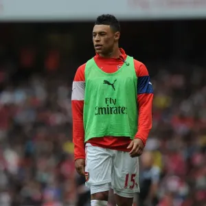 Arsenal's Alex Oxlade-Chamberlain in Action During Premier League Clash Against West Bromwich Albion (2014/15) Arsenal's Alex Oxlade-Chamberlain in Action During Premier League Clash Against West Bromwich Albion (2014/15)