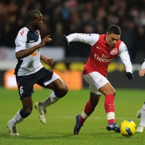 Arsenal's Alex Oxlade-Chamberlain Faces Off Against Bolton's Fabrice Muamba in Premier League Clash Arsenal's Alex Oxlade-Chamberlain Faces Off Against Bolton's Fabrice Muamba in Premier League Clash