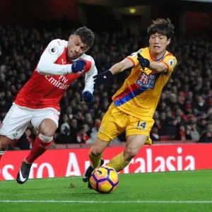 Arsenal's Alex Oxlade-Chamberlain Faces Off Against Crystal Palace's Chung-Yong Lee Arsenal's Alex Oxlade-Chamberlain Faces Off Against Crystal Palace's Chung-Yong Lee