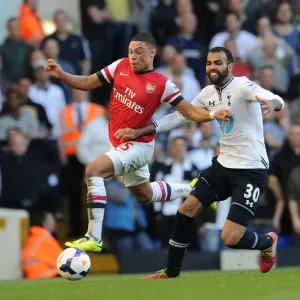 Arsenal's Alex Oxlade-Chamberlain Faces Off Against Tottenham's Sandro in Premier League Clash Arsenal's Alex Oxlade-Chamberlain Faces Off Against Tottenham's Sandro in Premier League Clash