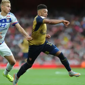Arsenal's Alex Oxlade-Chamberlain vs. Olympique Lyonnais Ulrich Jennsen: A Clash at the Emirates Cup 2015/16