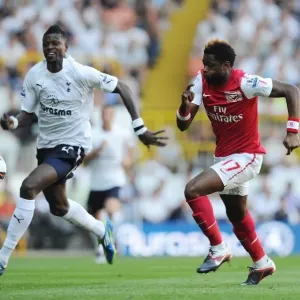Arsenal's Alex Song vs. Tottenham's Emmanuel Adebayor: A Rivalry Renewed in the 2011-12 Premier League Clash at White Hart Lane (2:1 in Spurs Favor) Arsenal's Alex Song vs. Tottenham's Emmanuel Adebayor: A Rivalry Renewed in the 2011-12 Premier League Clash at White Hart Lane (2:1 in Spurs Favor)