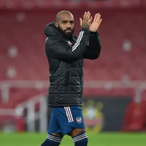 Arsenal's Alexandre Lacazette Celebrates with Fans after Europa League Victory over Rapid Wien