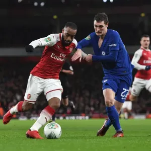 Arsenal's Alexandre Lacazette Clashes with Chelsea's Andreas Christensen in Carabao Cup Semi-Final Showdown Arsenal's Alexandre Lacazette Clashes with Chelsea's Andreas Christensen in Carabao Cup Semi-Final Showdown