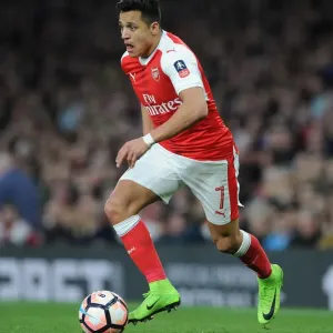 Arsenal's Alexis Sanchez in Action against Lincoln City in FA Cup Quarter-Final Arsenal's Alexis Sanchez in Action against Lincoln City in FA Cup Quarter-Final