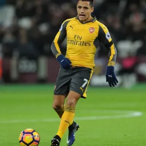 Arsenal's Alexis Sanchez in Action: Premier League Clash against West Ham United (2016-17) Arsenal's Alexis Sanchez in Action: Premier League Clash against West Ham United (2016-17)