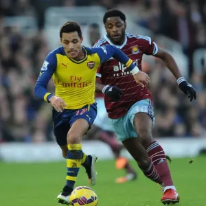 Arsenal's Alexis Sanchez Breaks Past West Ham's Alex Song in Premier League Clash (December 2014)