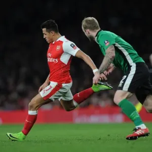 Arsenal's Alexis Sanchez Faces Off Against Lincoln City's Bradley Wood in FA Cup Quarter-Final Showdown