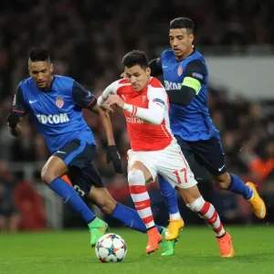 Arsenal's Alexis Sanchez Faces Off Against Monaco's Nabil Dirar and Anthony Martial in UEFA Champions League Showdown