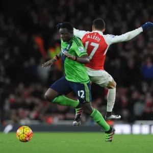 Arsenal's Alexis Sanchez Fouls by Southampton's Victor Wanyama in Intense Premier League Clash (2015-16) Arsenal's Alexis Sanchez Fouls by Southampton's Victor Wanyama in Intense Premier League Clash (2015-16)