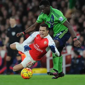 Arsenal's Alexis Sanchez Fouls by Southampton's Victor Wanyama in Premier League Clash Arsenal's Alexis Sanchez Fouls by Southampton's Victor Wanyama in Premier League Clash