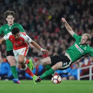 Arsenal's Alexis Sanchez Outmaneuvers Lincoln's Defenders in FA Cup Quarter-Final Showdown Arsenal's Alexis Sanchez Outmaneuvers Lincoln's Defenders in FA Cup Quarter-Final Showdown