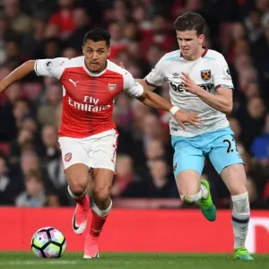 Arsenal's Alexis Sanchez Outmaneuvers West Ham's Sam Byram Arsenal's Alexis Sanchez Outmaneuvers West Ham's Sam Byram