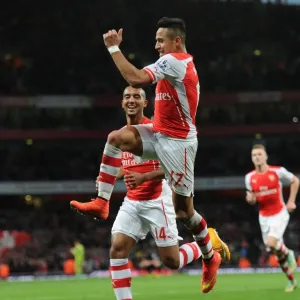 Arsenal's Alexis Sanchez and Theo Walcott: Dazzling Duo Celebrates Goals Against Burnley, 2014/15 Premier League Arsenal's Alexis Sanchez and Theo Walcott: Dazzling Duo Celebrates Goals Against Burnley, 2014/15 Premier League