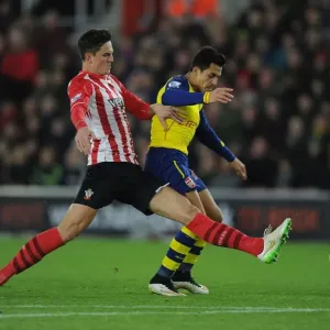Arsenal's Alexis Sanchez Tripped by Southampton's Florin Gardos during Premier League Clash