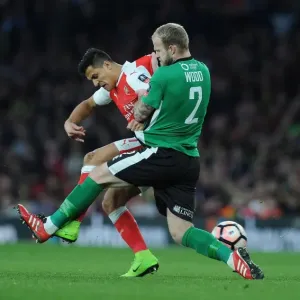 Arsenal's Alexis Sanchez vs. Bradley Wood: FA Cup Quarter-Final Showdown at Emirates Stadium Arsenal's Alexis Sanchez vs. Bradley Wood: FA Cup Quarter-Final Showdown at Emirates Stadium