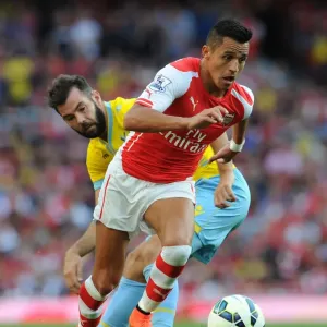 Arsenal's Alexis Sanchez vs. Crystal Palace's Joe Ledley: A Premier League Battle