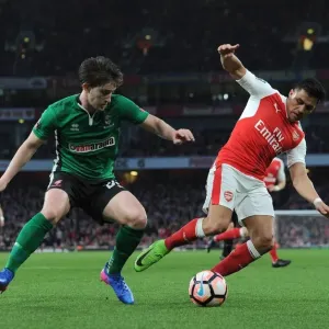Arsenal's Alexis Sanchez vs. Lincoln City's Alex Woodyard: A FA Cup Quarter-Final Battle Arsenal's Alexis Sanchez vs. Lincoln City's Alex Woodyard: A FA Cup Quarter-Final Battle