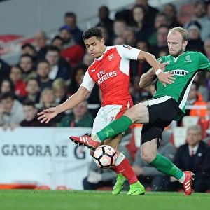 Arsenal's Alexis Sanchez vs. Lincoln's Bradley Wood: A FA Cup Quarter-Final Battle