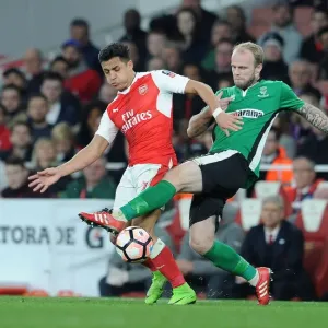 Arsenal's Alexis Sanchez vs. Lincoln's Bradley Wood: A FA Cup Quarter-Final Battle Arsenal's Alexis Sanchez vs. Lincoln's Bradley Wood: A FA Cup Quarter-Final Battle