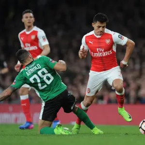 Arsenal's Alexis Sanchez vs. Nathan Arnold: A FA Cup Quarter-Final Showdown Arsenal's Alexis Sanchez vs. Nathan Arnold: A FA Cup Quarter-Final Showdown