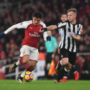 Arsenal's Alexis Sanchez vs. Newcastle's Matt Ritchie: A Premier League Showdown