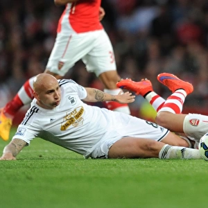 Arsenal's Alexis Sanchez vs Swansea's Jonjo Shelvey: Foul Clash in 2014/15 Premier League Match