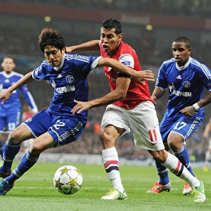 Arsenal's Andre Santos Clashes with Schalke's Atsuto Uchida and Jefferson Farfan