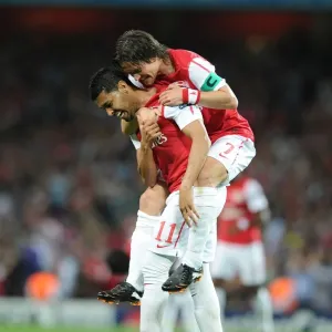 Arsenal's Andre Santos and Tomas Rosicky Celebrate Goal Against Olympiacos in 2011-12 UEFA Champions League