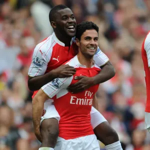 Arsenal's Arteta and Campbell Celebrate Goals Against Aston Villa (2015-16) Arsenal's Arteta and Campbell Celebrate Goals Against Aston Villa (2015-16)