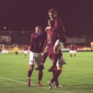 Arsenal's Arturo Lupoli, Nicklas Bendtner, and Jay Simpson Celebrate Goal Against Southampton Reserves