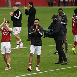Arsenal's Aubameyang Celebrates with Fans after Arsenal v Brighton Win
