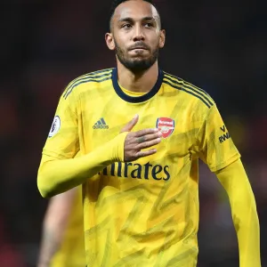 Arsenal's Aubameyang Celebrates Victory over Manchester United with Fans