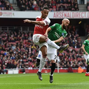 Arsenal's Aubameyang Faces Off Against Brighton's Bruno in Intense Premier League Clash