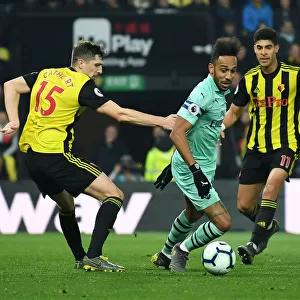 Arsenal's Aubameyang Faces Off Against Watford Defenders during Premier League Clash (2018-19)
